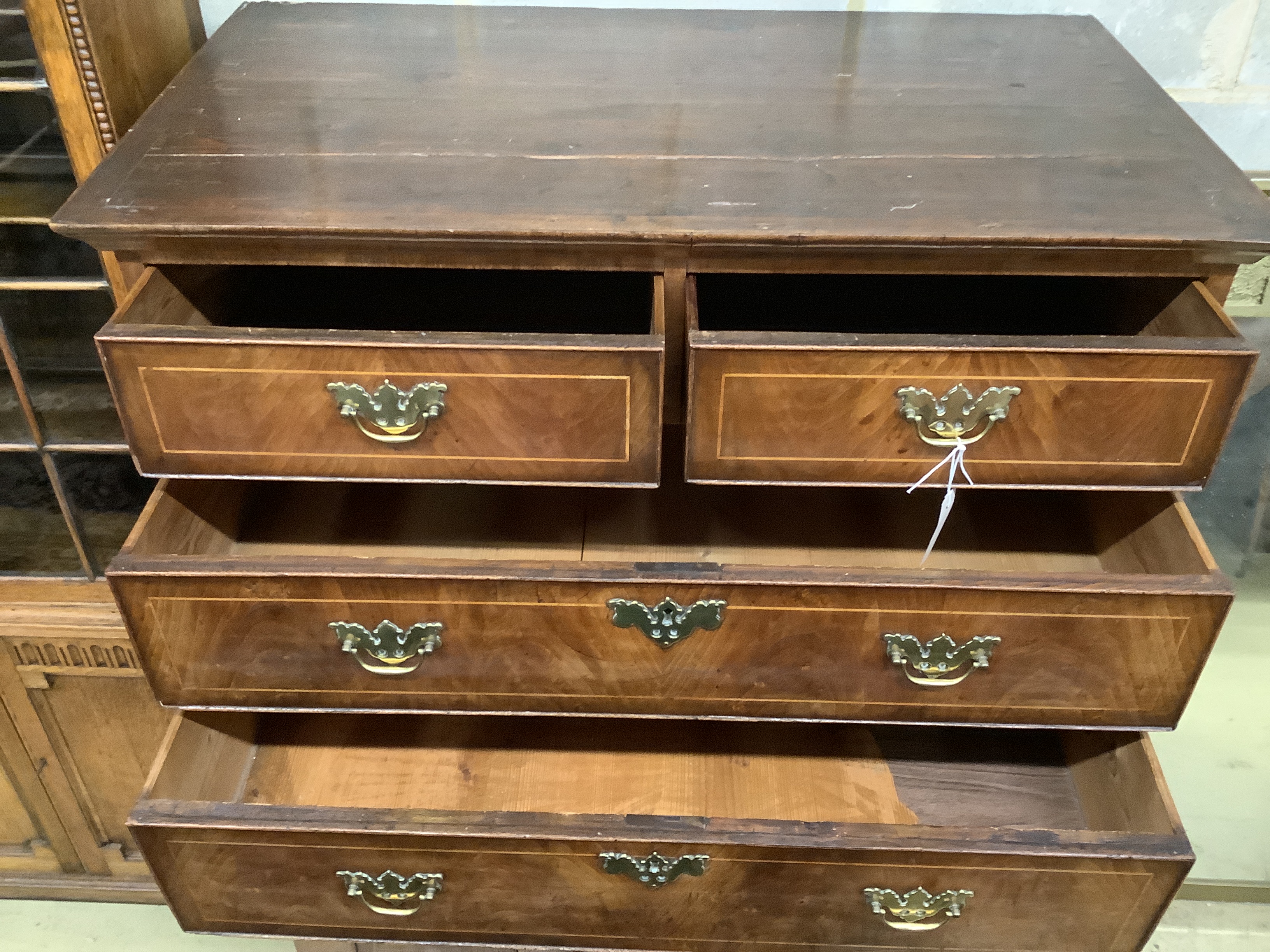 An 18th century walnut chest on stand, width 97cm, depth 56cm, height 146cm